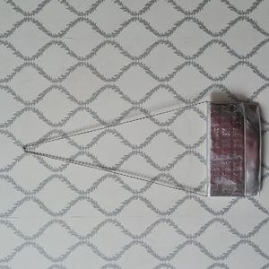 Pochette sling.